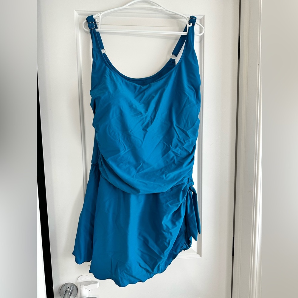 Blue swim dress tummy control from Amazon. Was too big for me. Brand new